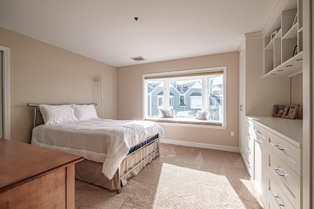 148 Breakwater Dr Unit 17, South Portland, ME 04106 - bedroom with baseboards and light carpet