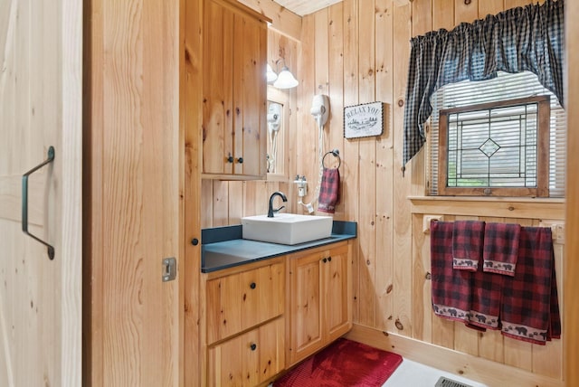 8 Log Cabin Ln Unit 9, Shapleigh, ME 04076 - bathroom with vanity and wooden walls