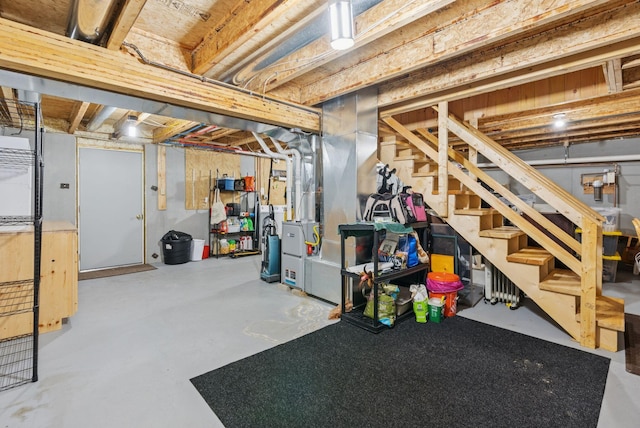8 Log Cabin Ln Unit 9, Shapleigh, ME 04076 - unfinished below grade area featuring stairs and heating unit