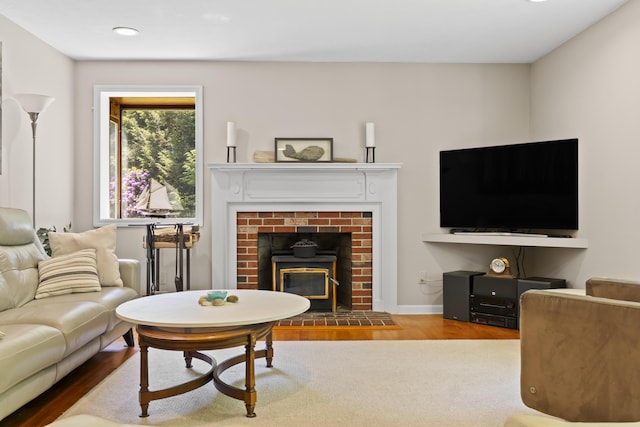 15 Harvey Brook Dr, Freeport, ME 04032 - living room featuring wood finished floors, a fireplace, and recessed lighting