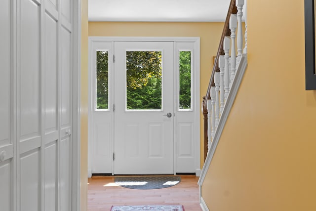 15 Harvey Brook Dr, Freeport, ME 04032 - doorway featuring stairs and wood finished floors