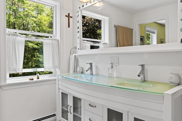 15 Harvey Brook Dr, Freeport, ME 04032 - bathroom with double vanity and a baseboard heating unit