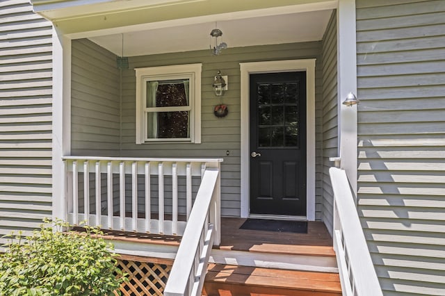 15 Harvey Brook Dr, Freeport, ME 04032 - doorway to property featuring covered porch