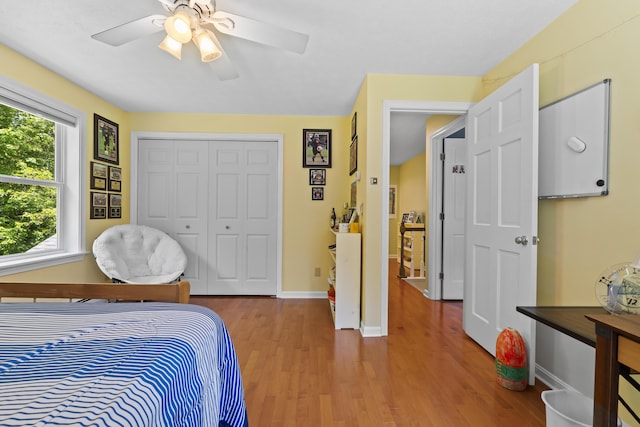 15 Harvey Brook Dr, Freeport, ME 04032 - bedroom with wood finished floors, ceiling fan, and a closet