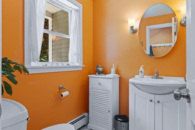 15 Harvey Brook Dr, Freeport, ME 04032 - half bath with a baseboard heating unit and vanity