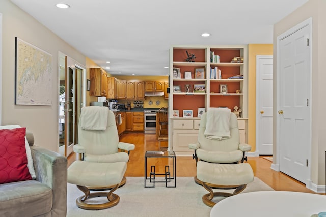15 Harvey Brook Dr, Freeport, ME 04032 - living room with light wood finished floors and recessed lighting