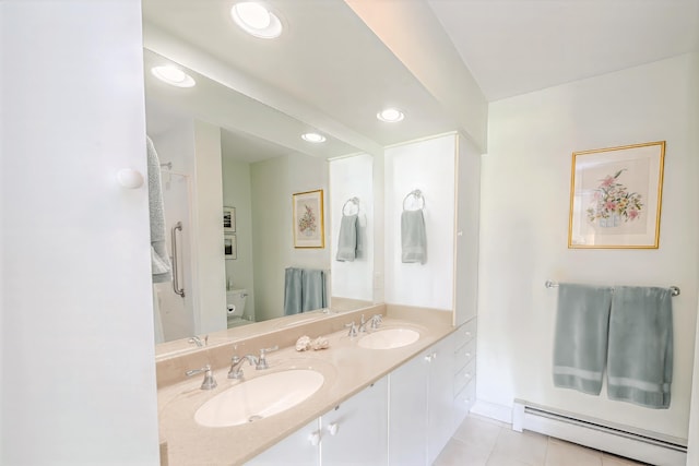 97 Dockside Ln Unit 8, Belfast, ME 04915 - full bath featuring a baseboard heating unit, tile patterned floors, double vanity, recessed lighting, and a shower