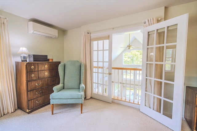 97 Dockside Ln Unit 8, Belfast, ME 04915 - living area featuring a wall unit AC, carpet floors, and ceiling fan
