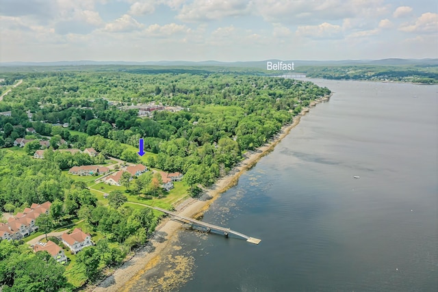 97 Dockside Ln Unit 8, Belfast, ME 04915 - drone / aerial view of a nearby body of water and a heavily wooded area