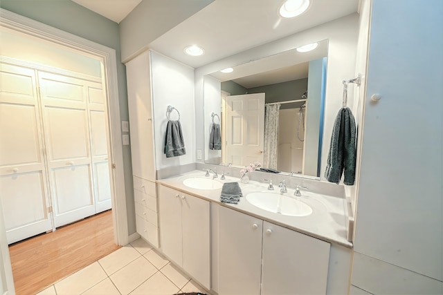 97 Dockside Ln Unit 8, Belfast, ME 04915 - bathroom with tile patterned floors and double vanity