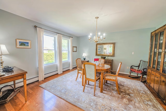 97 Dockside Ln Unit 8, Belfast, ME 04915 - dining room with a chandelier and wood finished floors