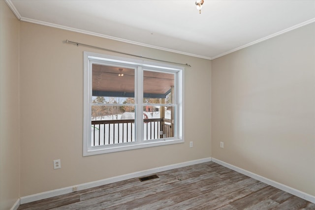 431 Bardon Hill Rd, Etna, ME 04434 - unfurnished room with wood finished floors and crown molding