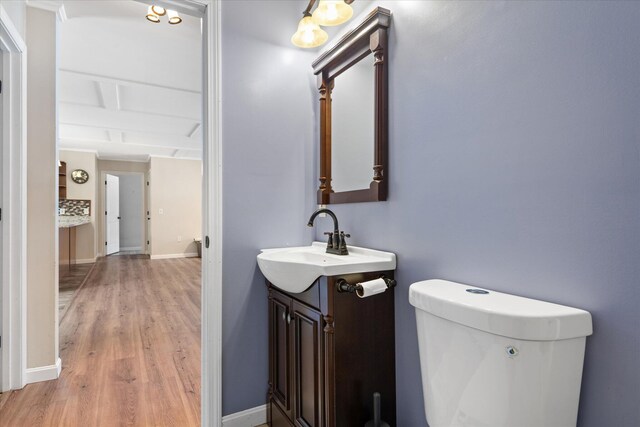 431 Bardon Hill Rd, Etna, ME 04434 - bathroom with vanity and wood finished floors