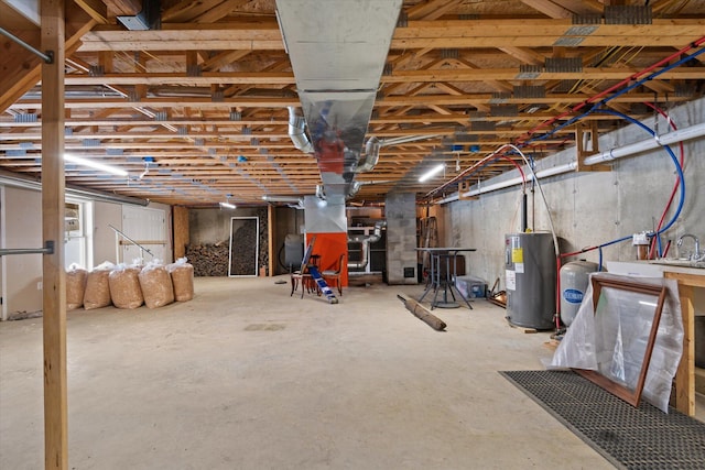 431 Bardon Hill Rd, Etna, ME 04434 - unfinished below grade area featuring electric water heater and a water pressure tank