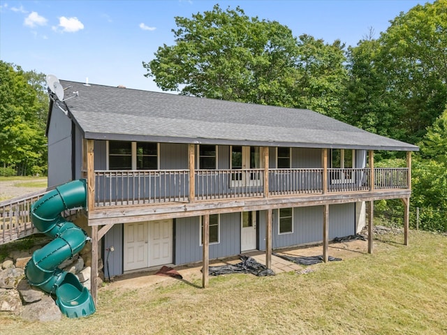 431 Bardon Hill Rd, Etna, ME 04434 - view of front of property featuring roof with shingles, a front yard, and a playground