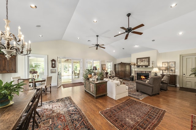 58 Church St, Belfast, ME 04915 - living room with vaulted ceiling, a brick fireplace, a ceiling fan, dark wood finished floors, and recessed lighting
