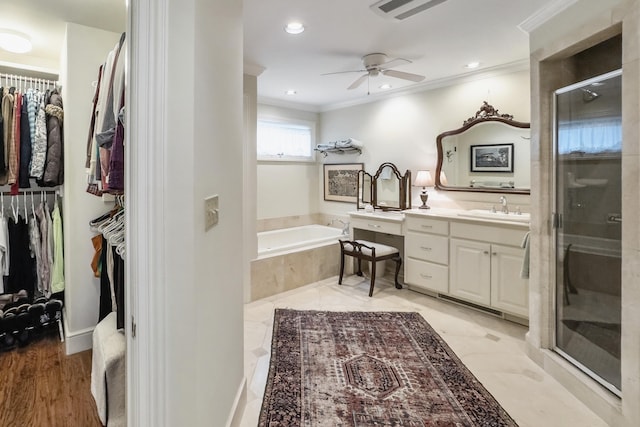 58 Church St, Belfast, ME 04915 - full bathroom with vanity, a bath, crown molding, a ceiling fan, and a walk in closet