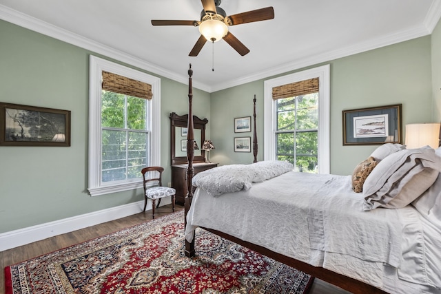58 Church St, Belfast, ME 04915 - bedroom with wood finished floors, crown molding, and a ceiling fan