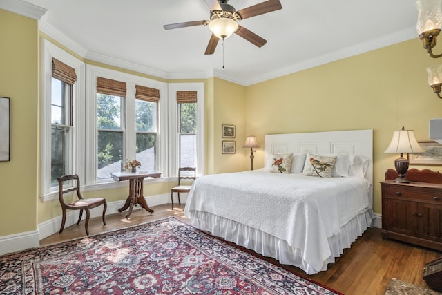 58 Church St, Belfast, ME 04915 - bedroom featuring wood finished floors, crown molding, and a ceiling fan