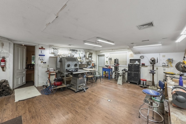 58 Church St, Belfast, ME 04915 - miscellaneous room featuring wood finished floors and a workshop area