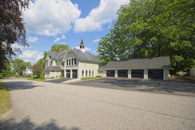 58 Church St, Belfast, ME 04915 - view of front of house featuring community garages and a chimney