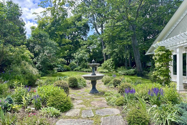58 Church St, Belfast, ME 04915 - view of yard with view of scattered trees and a pergola