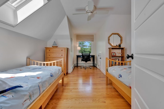 13 Norwood Ln, Kennebunkport, ME 04046 - bedroom featuring lofted ceiling, light wood-style flooring, a skylight, and a ceiling fan
