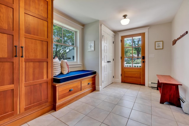 13 Norwood Ln, Kennebunkport, ME 04046 - entryway featuring a baseboard radiator, healthy amount of natural light, and light tile patterned floors