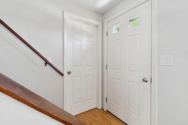 46 Label Ave, Portland, ME 04103 - foyer featuring light wood-style flooring and stairs