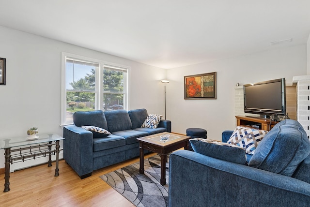 46 Label Ave, Portland, ME 04103 - living area featuring light wood finished floors and baseboard heating