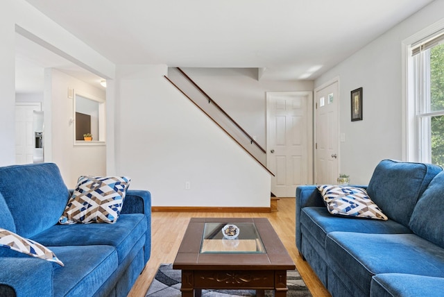 46 Label Ave, Portland, ME 04103 - living area featuring wood finished floors and stairway