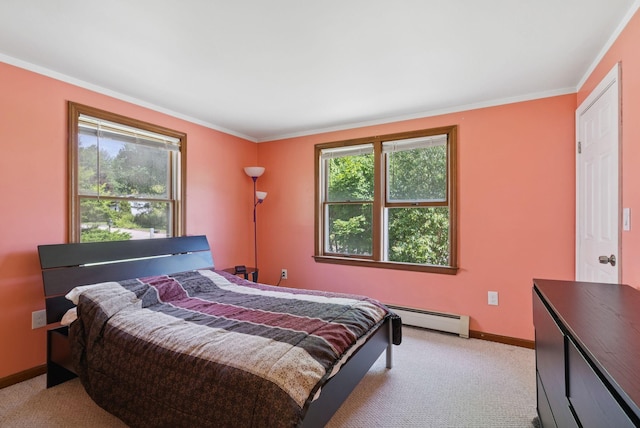 46 Label Ave, Portland, ME 04103 - bedroom featuring a baseboard heating unit, multiple windows, light colored carpet, and crown molding