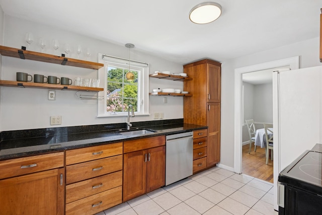 54 Vannah Ave, Portland, ME 04103 - kitchen with dishwasher, electric stove, open shelves, freestanding refrigerator, and brown cabinetry