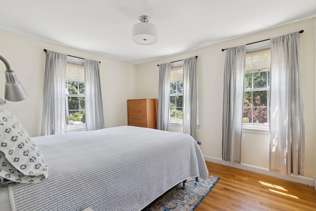 54 Vannah Ave, Portland, ME 04103 - bedroom featuring light wood-type flooring and baseboards