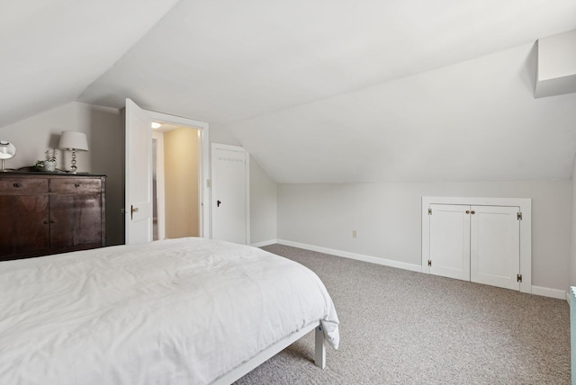 54 Vannah Ave, Portland, ME 04103 - bedroom with lofted ceiling and carpet floors