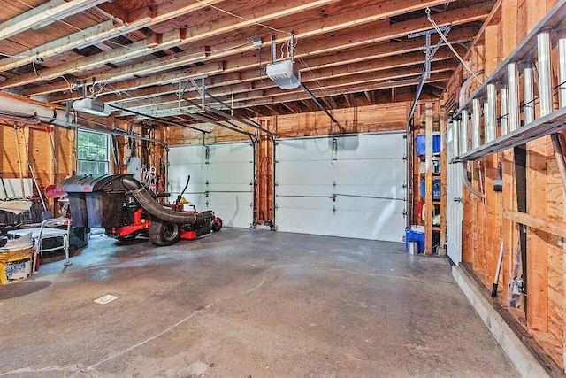 4 Acorn Ln, Lewiston, ME 04240 - garage with a garage door opener