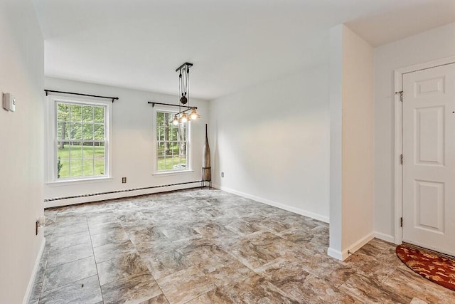 4 Acorn Ln, Lewiston, ME 04240 - spare room with a baseboard radiator and baseboards