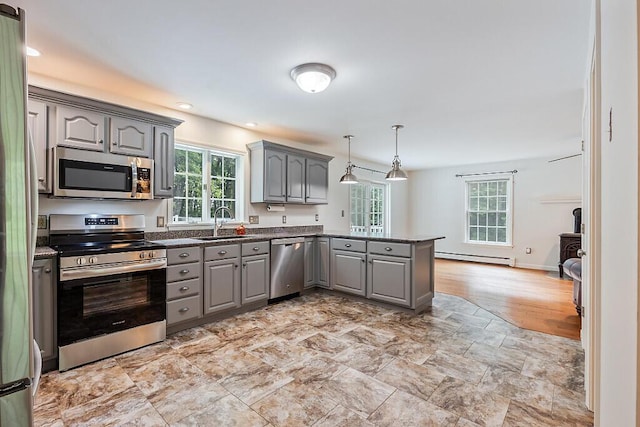 4 Acorn Ln, Lewiston, ME 04240 - kitchen featuring gray cabinets, stainless steel appliances, a peninsula, healthy amount of natural light, and recessed lighting