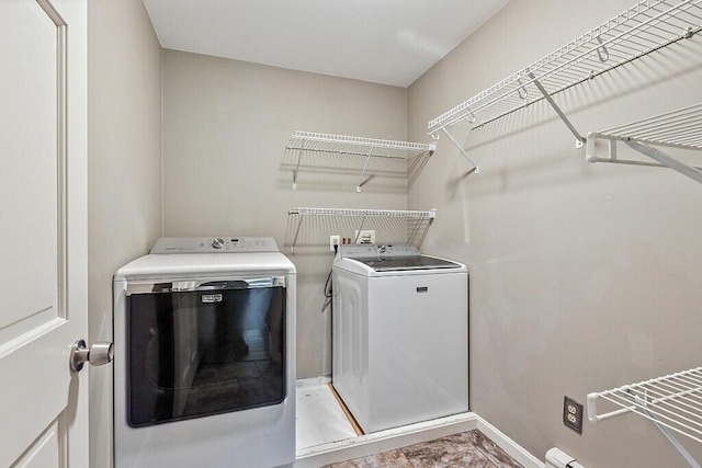 4 Acorn Ln, Lewiston, ME 04240 - laundry room with washing machine and dryer and baseboards