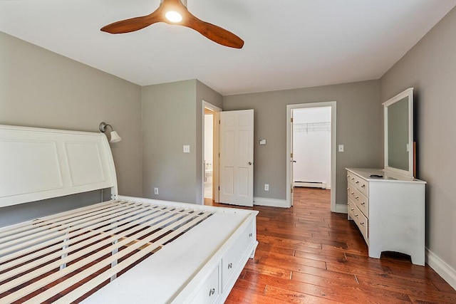 4 Acorn Ln, Lewiston, ME 04240 - unfurnished bedroom with hardwood / wood-style floors, a baseboard heating unit, ceiling fan, and a spacious closet