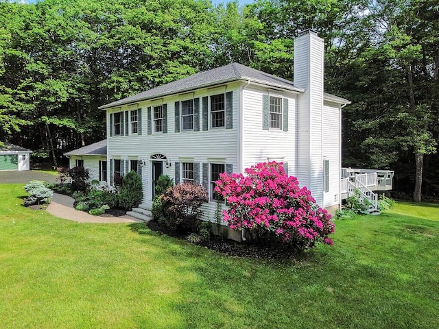 4 Acorn Ln, Lewiston, ME 04240 - colonial house featuring a chimney and a front lawn