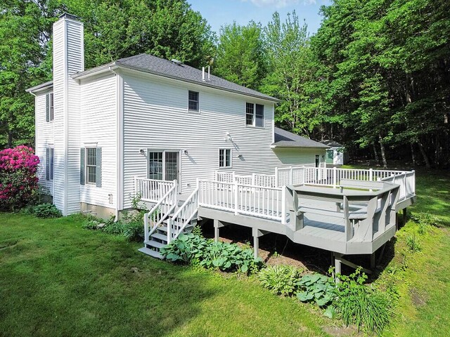 4 Acorn Ln, Lewiston, ME 04240 - rear view of property with a chimney, a yard, and a deck