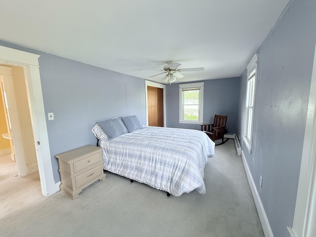 21 Peary Ter, South Portland, ME 04106 - bedroom with light carpet, ceiling fan, and a closet