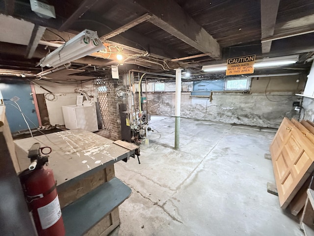 21 Peary Ter, South Portland, ME 04106 - below grade area featuring washing machine and clothes dryer and a heating unit