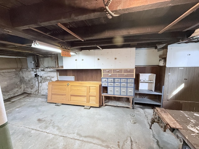 21 Peary Ter, South Portland, ME 04106 - unfinished basement featuring a workshop area