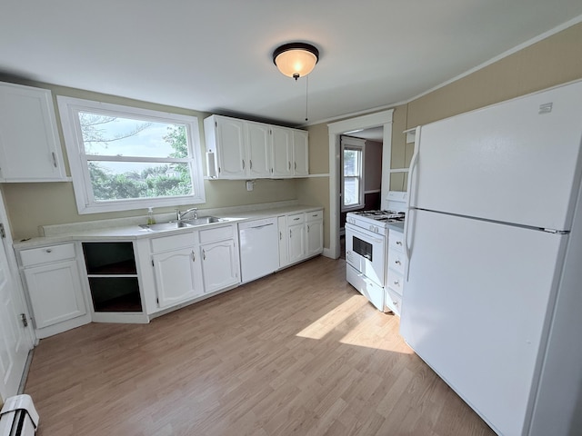 21 Peary Ter, South Portland, ME 04106 - kitchen featuring white appliances, white cabinets, baseboard heating, and light wood finished floors