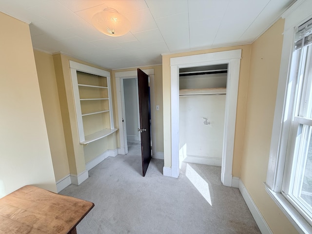 21 Peary Ter, South Portland, ME 04106 - unfurnished bedroom with light colored carpet, multiple windows, and a closet