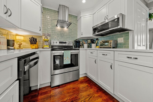 12 Fillmore Ave, South Portland, ME 04106 - kitchen featuring stainless steel appliances, ventilation hood, decorative backsplash, white cabinets, and light countertops