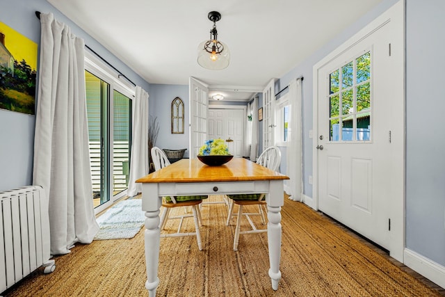 12 Fillmore Ave, South Portland, ME 04106 - dining space with radiator and baseboards