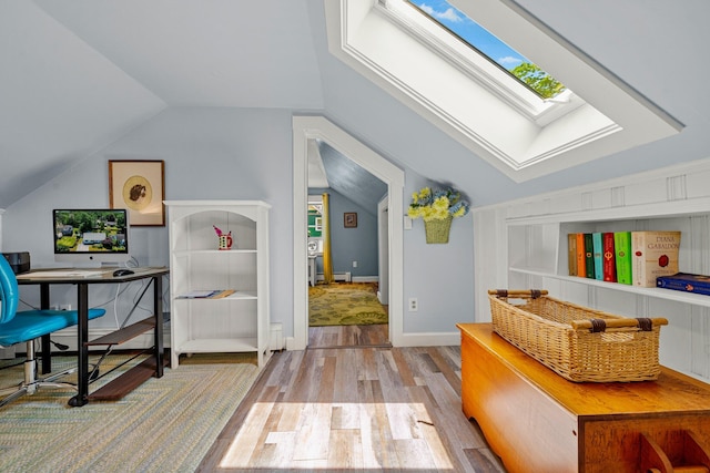 12 Fillmore Ave, South Portland, ME 04106 - office area with a skylight, wood finished floors, lofted ceiling, and a baseboard heating unit